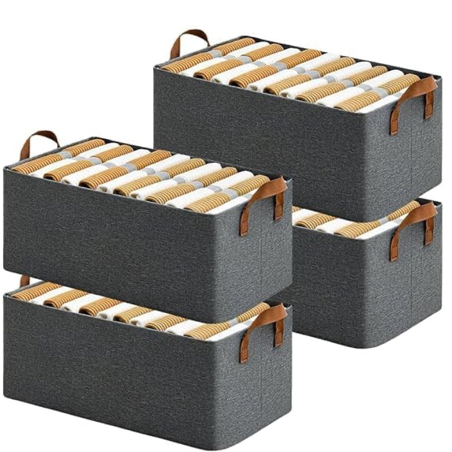 Grey storage boxes stacked with folded t-shirts